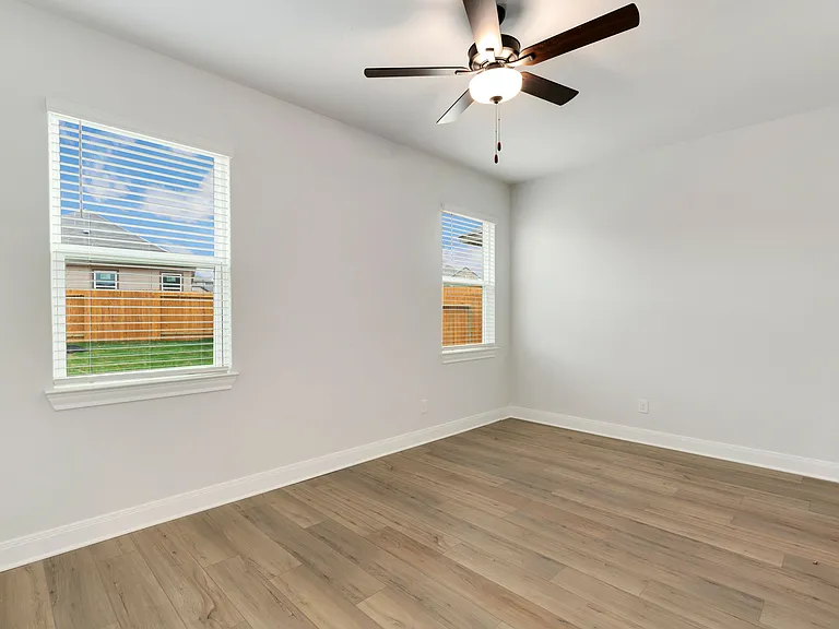 Master bedroom also has vinyl flooring.