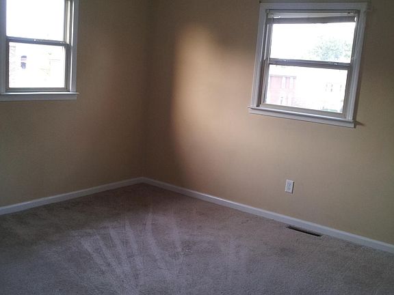 All three bedrooms are upstairs and are carpeted.