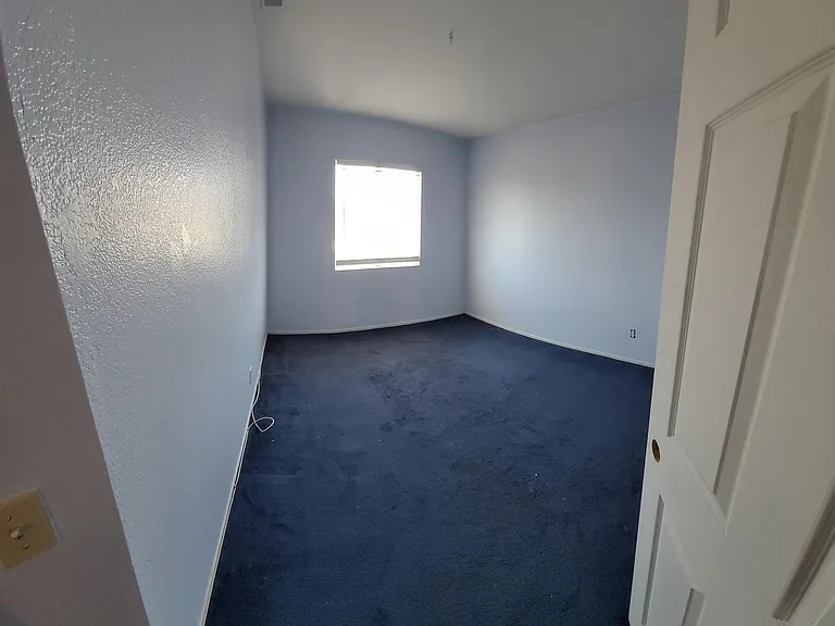 Upstairs Rear Bed Room (Curved Due to Panoramic Shot)