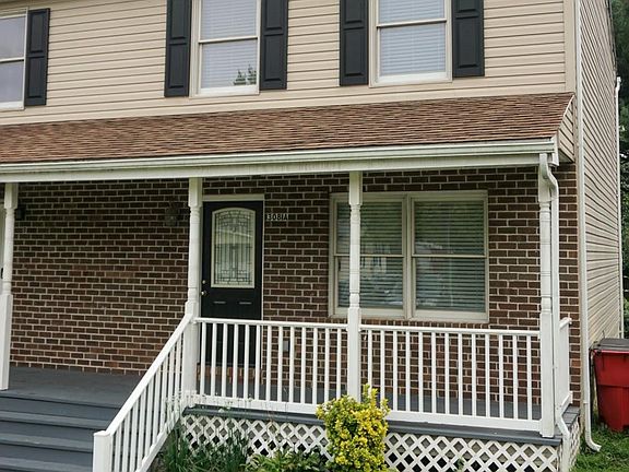 Welcome home! Comfortable covered front porch.
