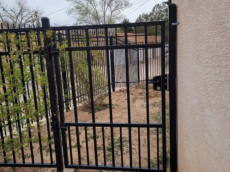 223 - Locked gates add security to your backyard space.