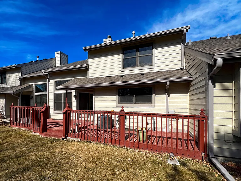 Large deck with grill and patio furniture. Updated photos coming soon.