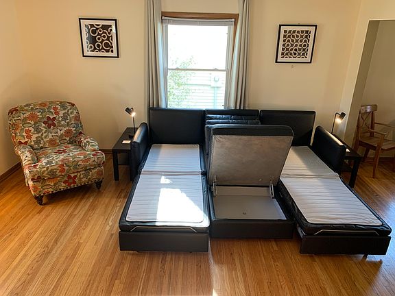 Living room. Sleeper Sofa and Ottoman open.
