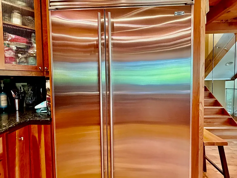 Large Subzero fridge. Freezer is on the right side, fridge is on the left side.