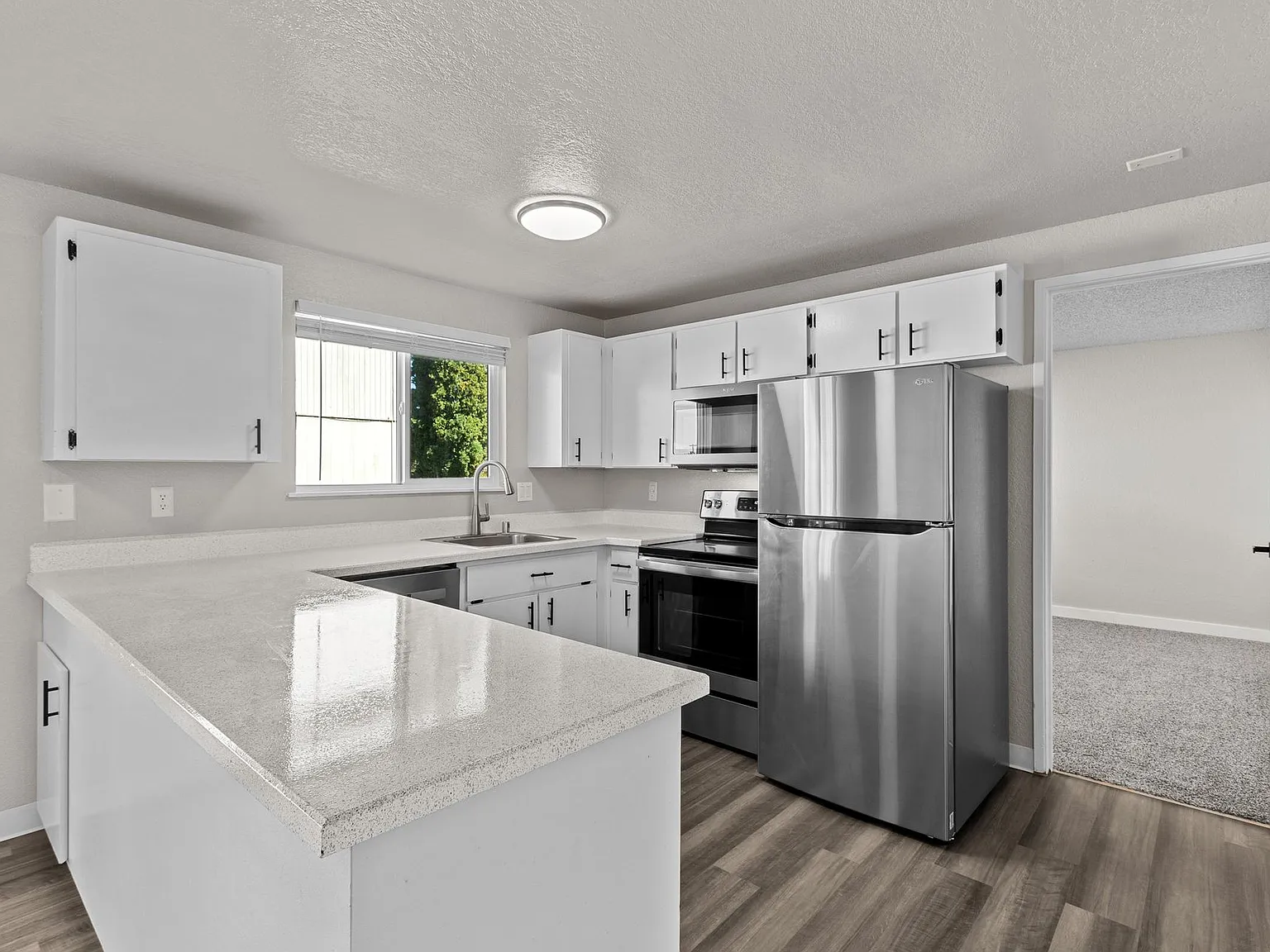 One of the largest 2 bedrooms in the area with 1.5 bathrooms and 1100 square feet plus your own l... — Photo 2