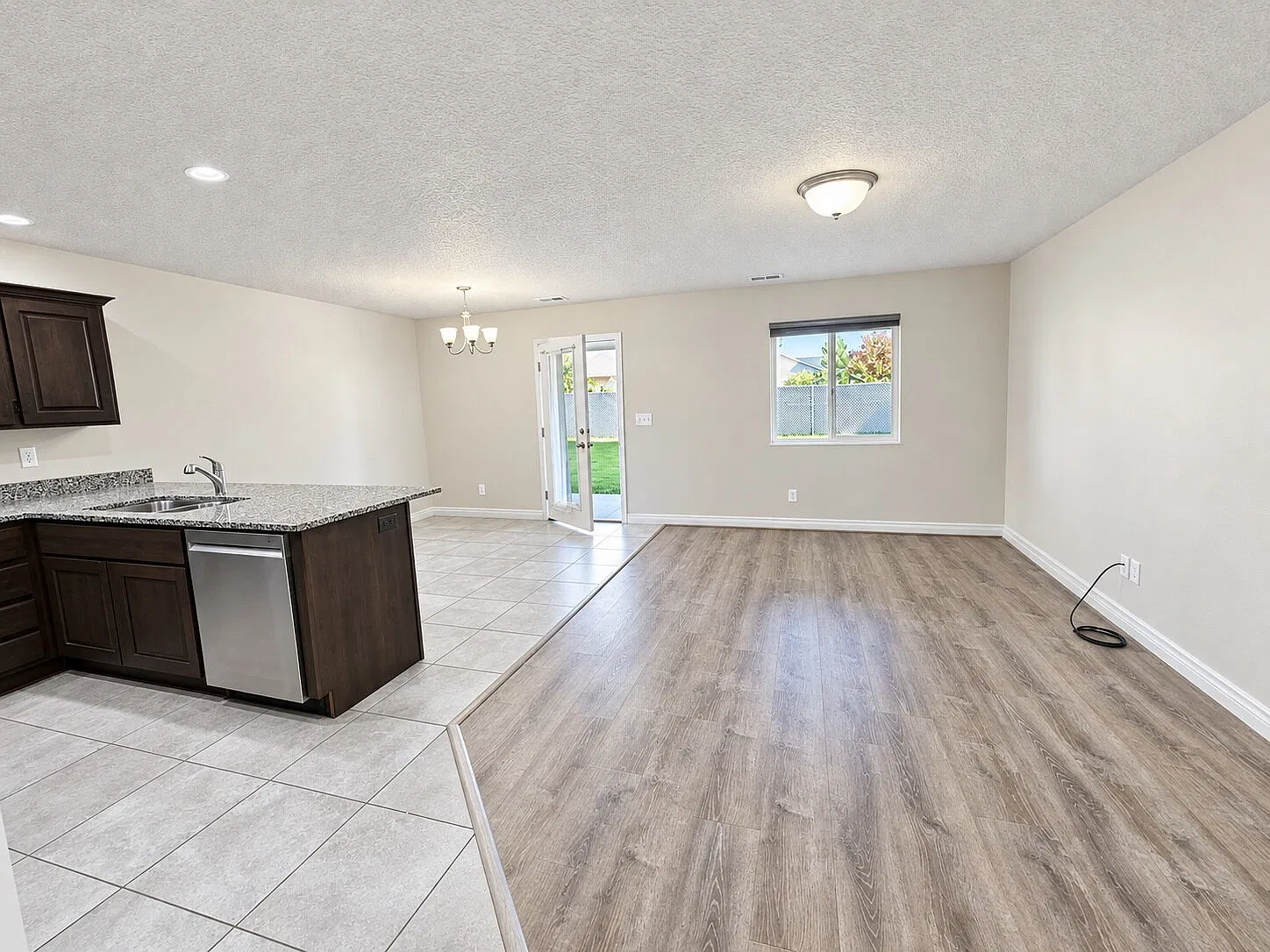 Updated 3-Bed Townhouse with Elegant Granite Countertops & Modern Living Spaces! — Photo 4