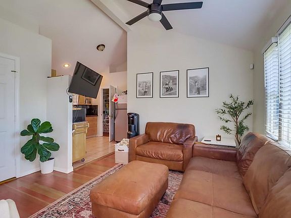 Open concept living room with huge Vaulted ceilings.