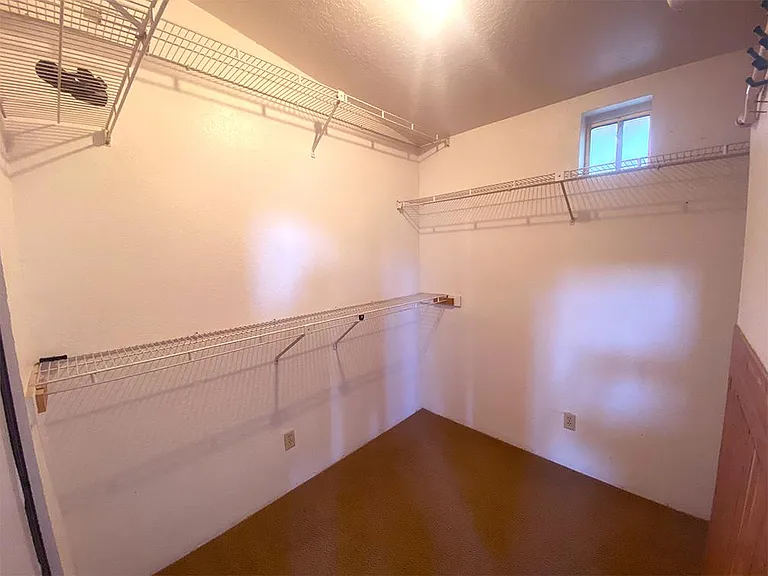 Upstairs walk-in closet