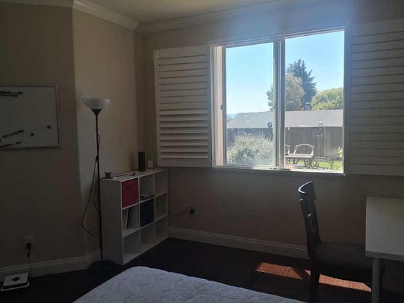 bedroom facing backyard