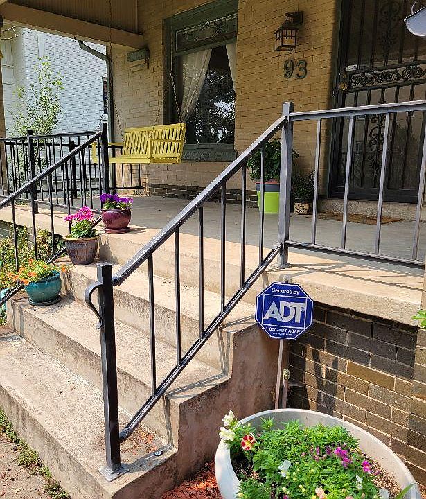 Sunny front porch. Add a swing or comfy chairs and enjoy.