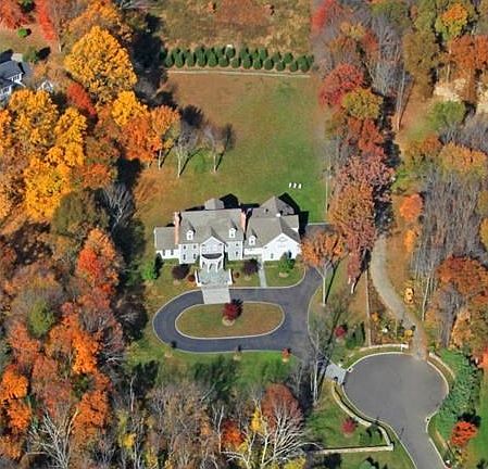 Nestled on a private cul-de-sac lined w/trees and lamp posts off