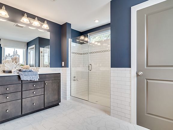 Dual vanities in owner s bath