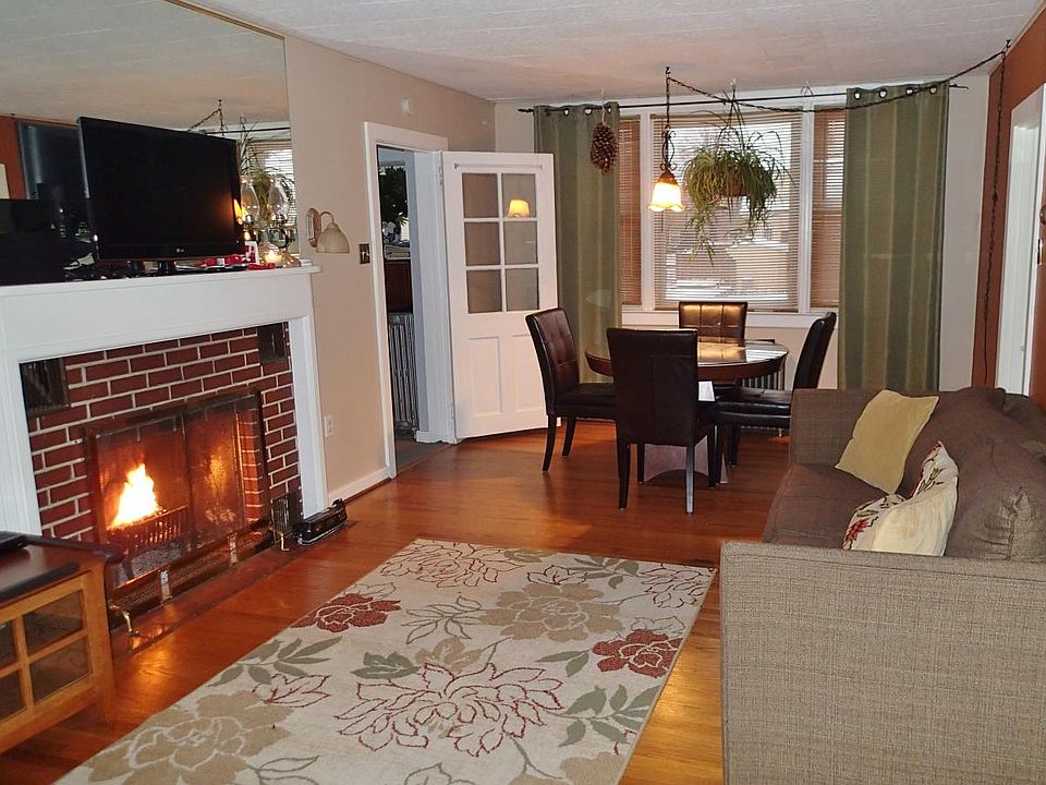 Spacious Living Room with Wood-Burning Fireplace