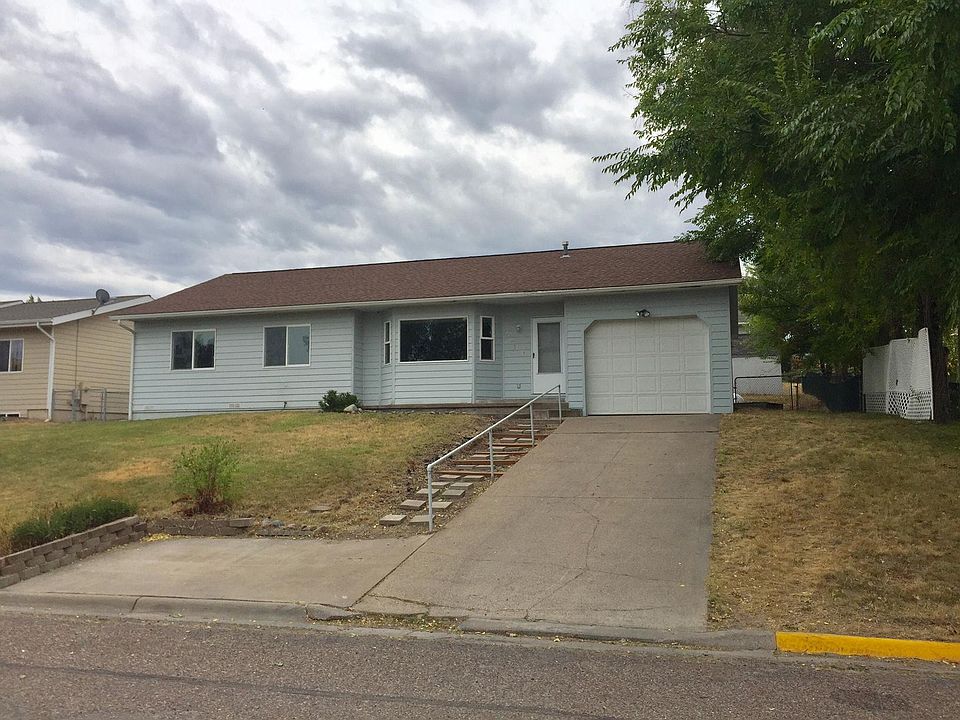 Driveway with attached garage.