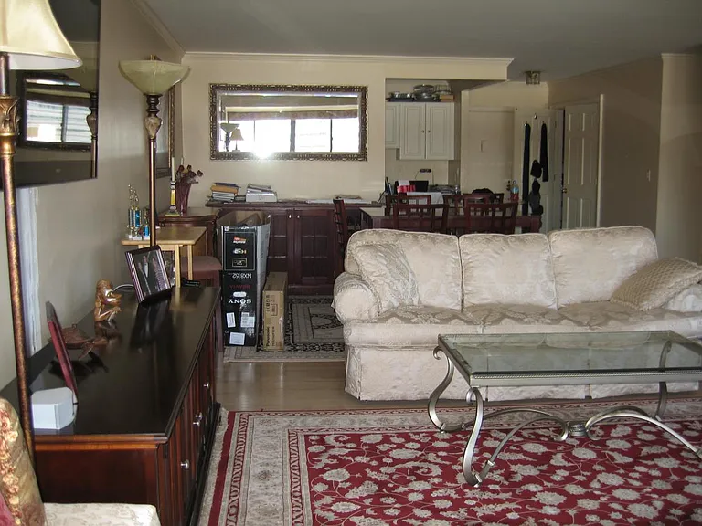 view from enclosed balcony to kitchen