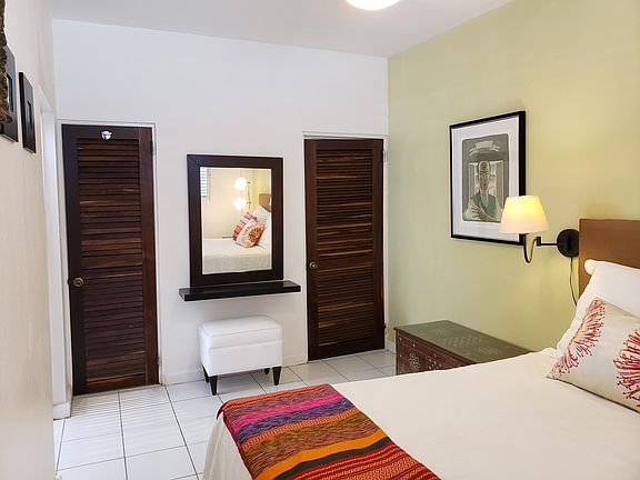 Bedroom with walk-in closet.