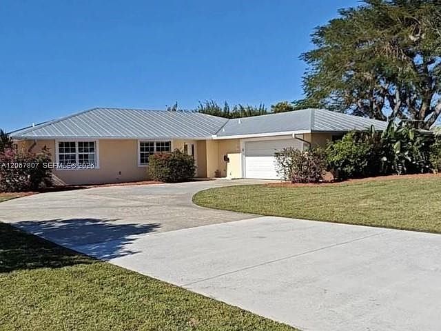 1st image of 2472 NW Everglades Blvd