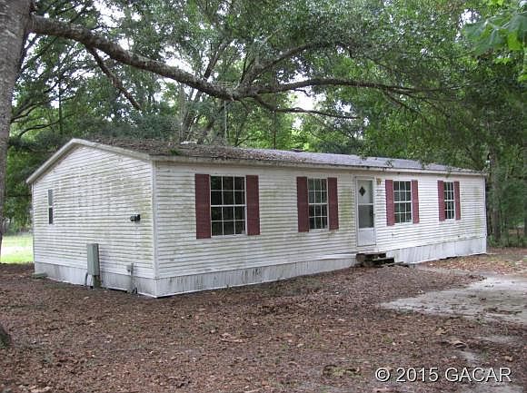 1st image of 9599 NW 56th Ln