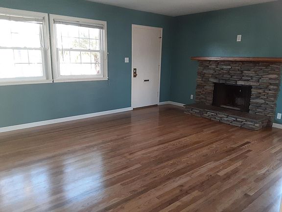 Living room as you enter from the front door. (We have a new door now)