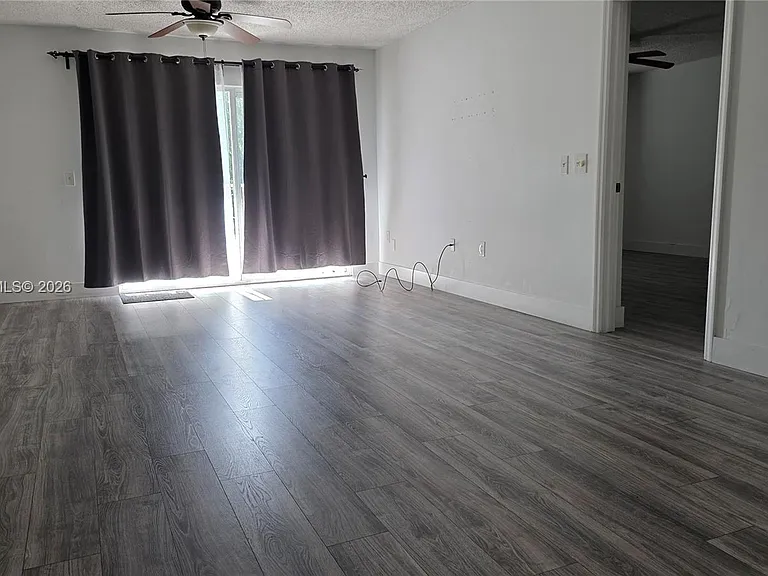 5011 Wiles Rd #203 — Photo 11
