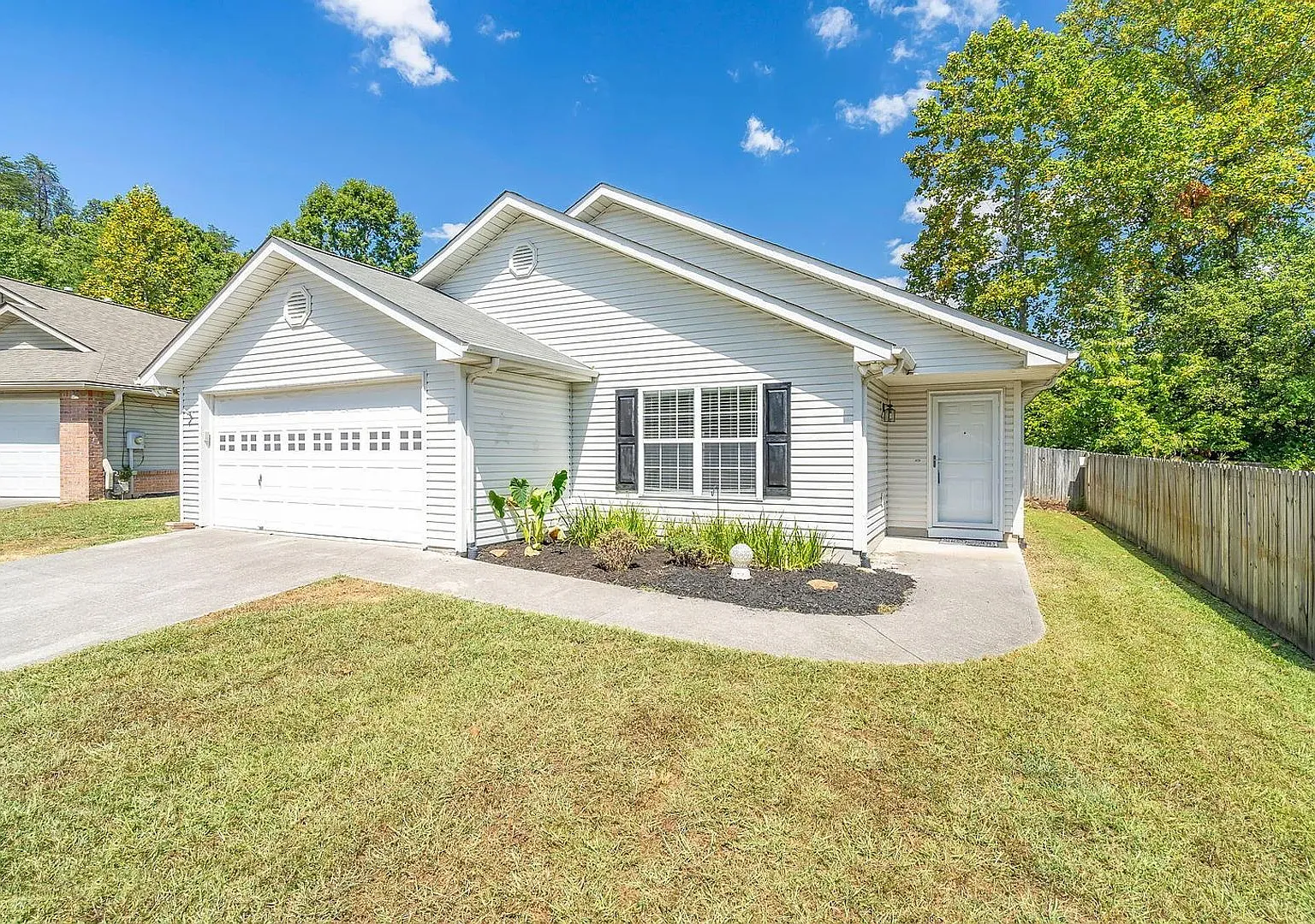 Charming 3-Bedroom Home with Fenced Yard & 2-Car Garage — Photo 1