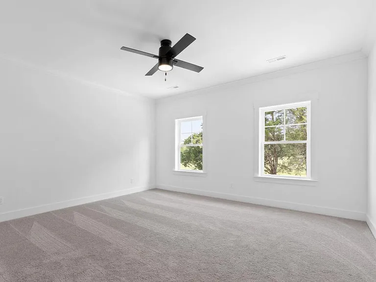Spacious guest bedroom #2 with walk-in closet.