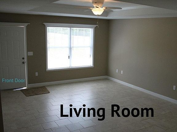 Front Door, Living Room with ceiling fan