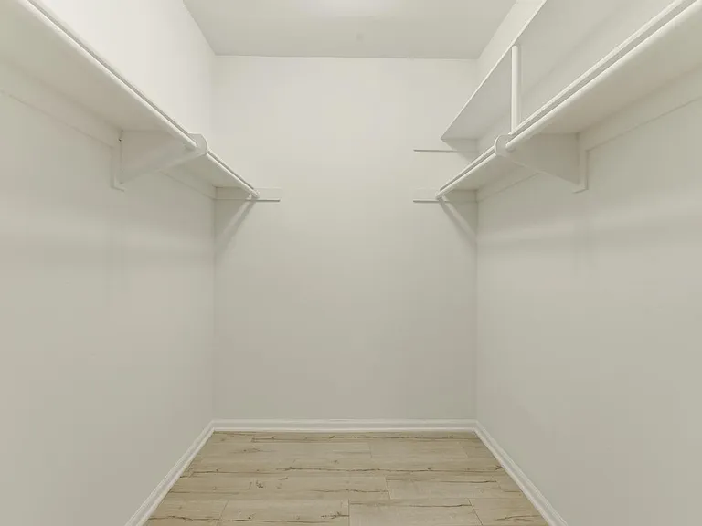 Spacious walk-in closet for primary suite