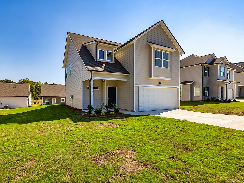 Another stunning perspective of the Bradford Craftsman! This view highlights the elegant facade, inviting covered front porch, and timeless design that makes this home a standout in Valley Place.