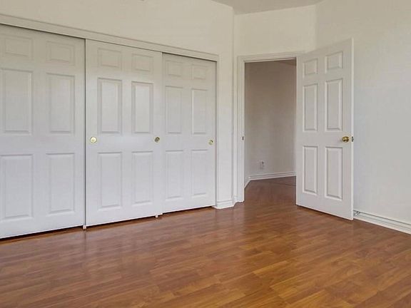 Bedroom facing closets