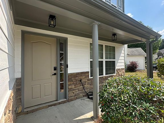 Covered Porch Entry with Updating Lighting and Keyless Entry