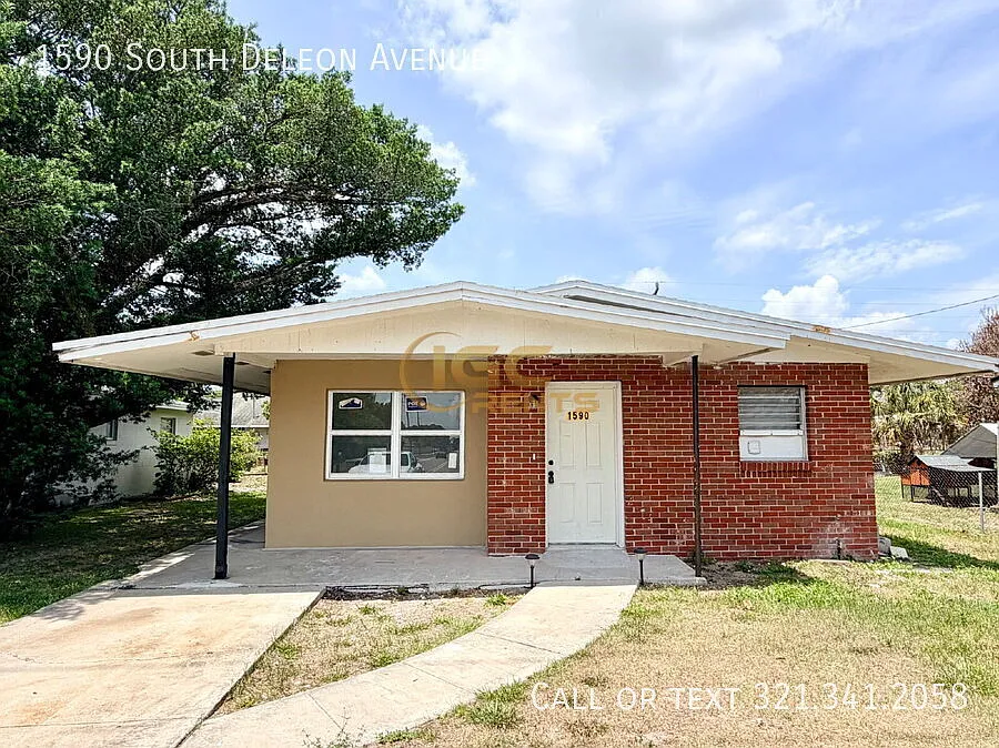 Half Off First Month's Rent "Comfortable 3-Bedroom 1072 Sq. Ft. Home in Titusville!" — Photo 1
