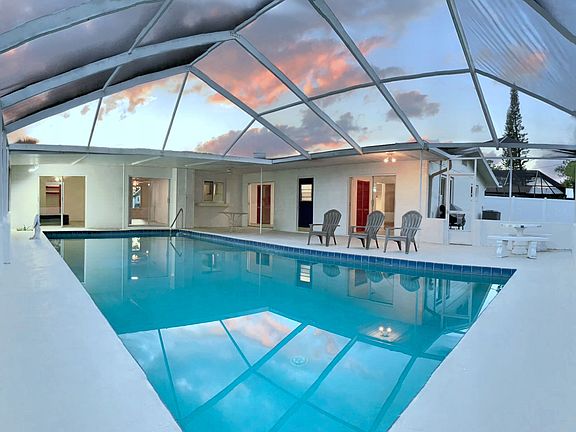 Full screened 400 sq ft pool, 7" deep max.