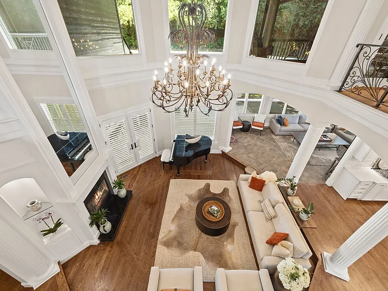 Upstairs View of Great Room and Sunroom, Kitchen is to the Right of the Picture