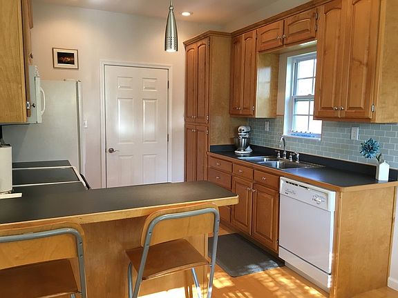 Custom maple cabinetry & lots of storage