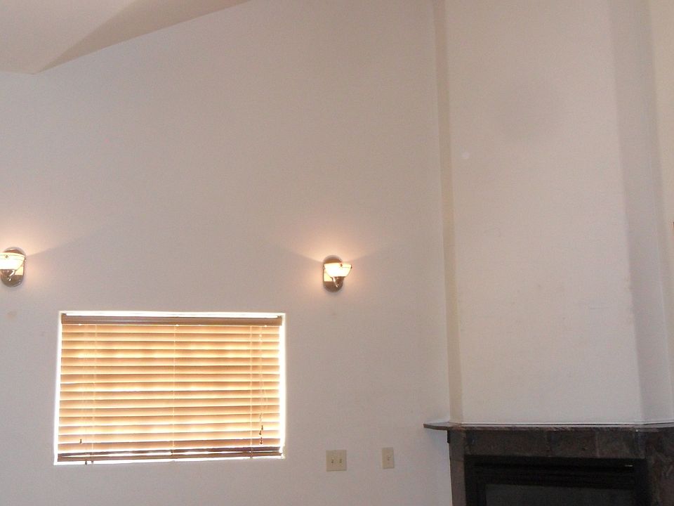 Cathedral ceilings, 2 ceiling fans and a sky light (not shown)