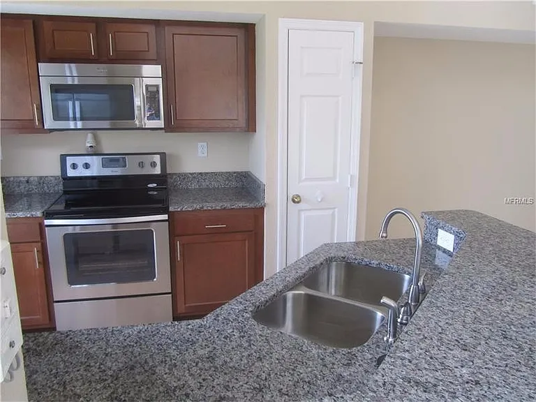 9020 Lake Chase Island Way — Photo 9