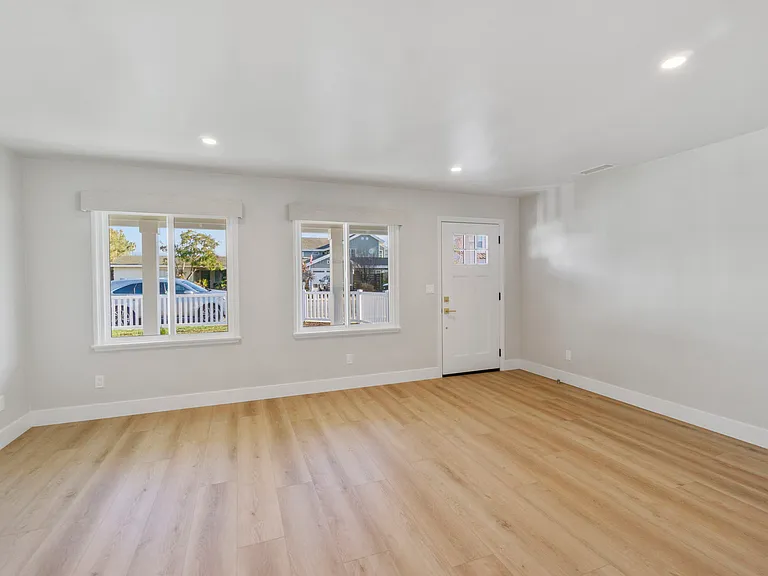 Natural light and custom window treatments in the great room