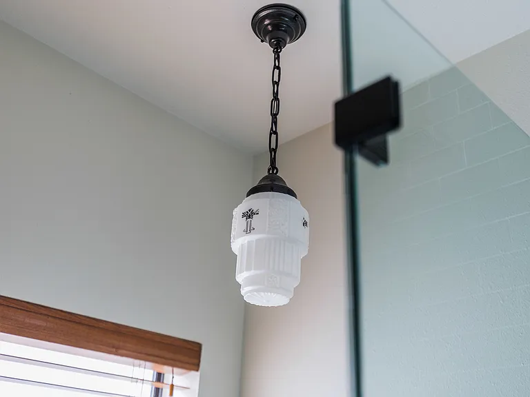 Antique milk glass light feature from the 1920s