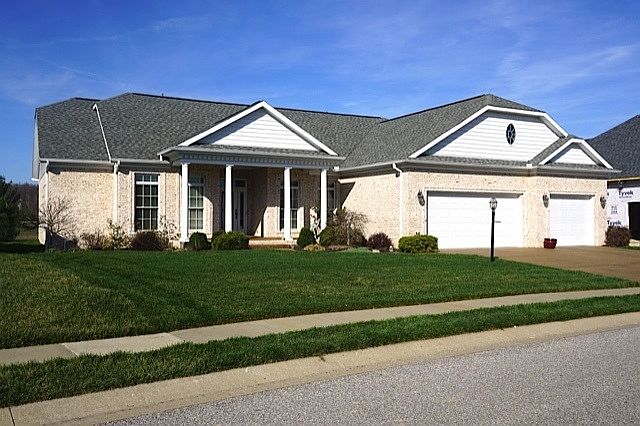 Parade home in 2006. Features 19 x 6 covered front porch, nicely landscaped with grass sod and sprinkler system.