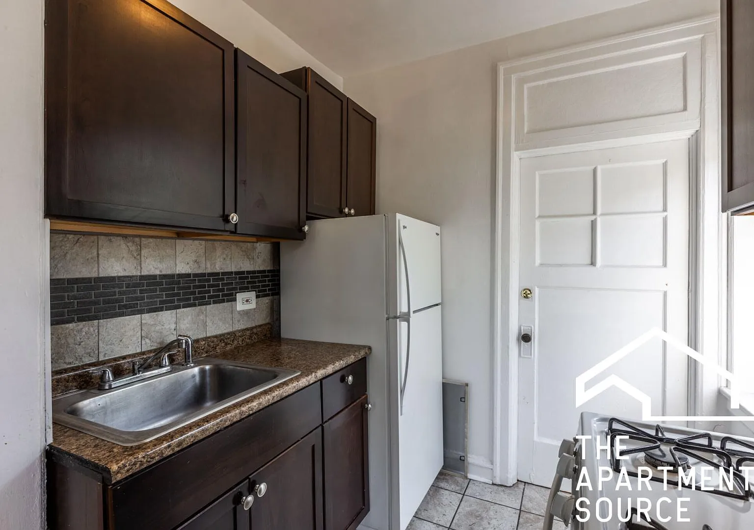 1367 W Estes Ave — Photo 2
