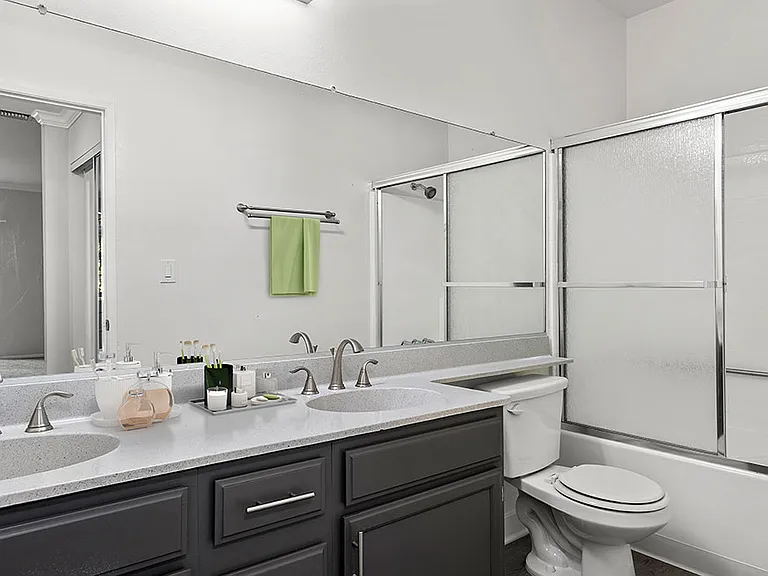 Modern styled bathroom with shower and tub.