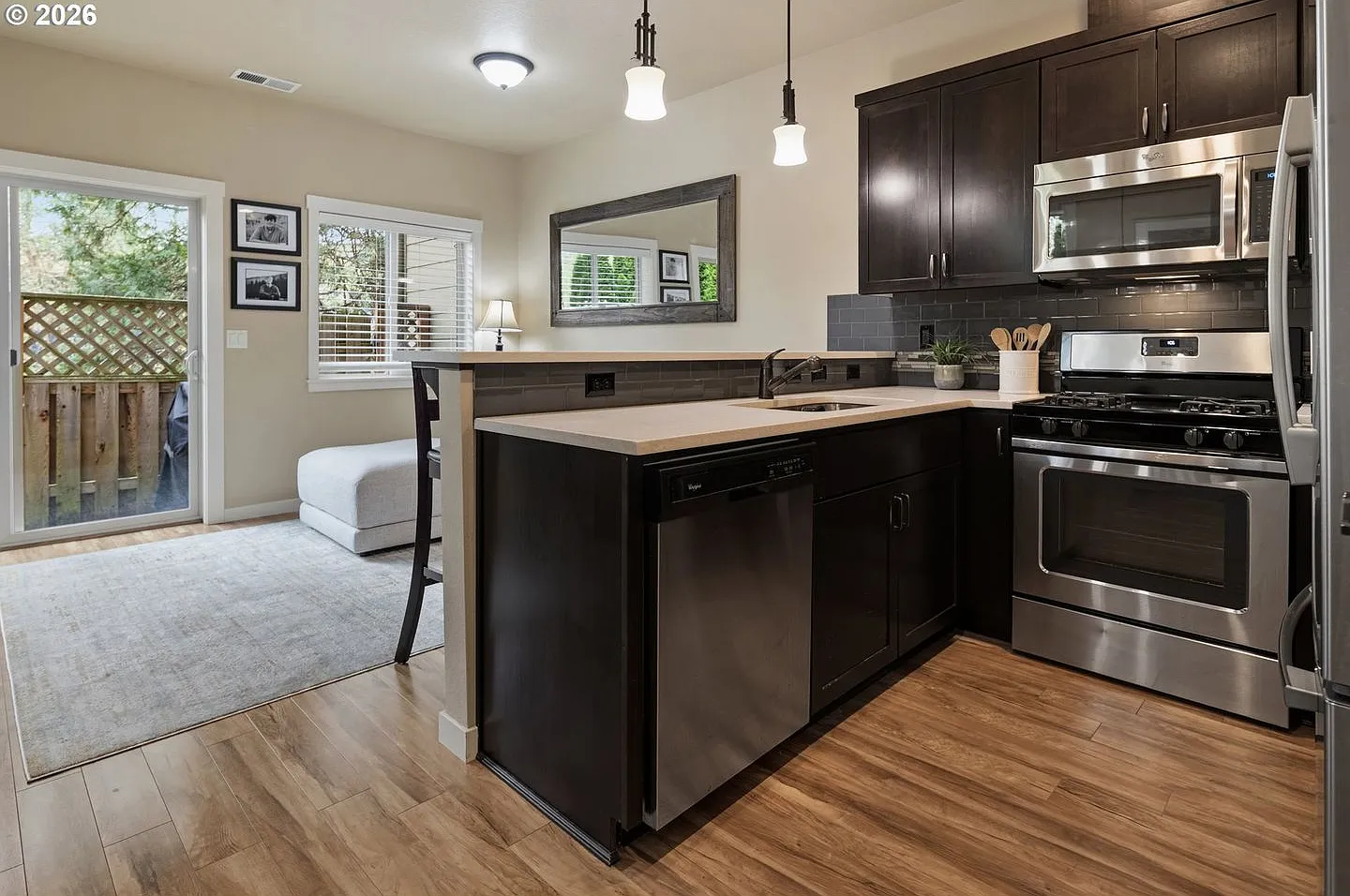 Stunning Progress Ridge End-Unit Townhome with Modern Kitchen, Dual Suites & Spacious Loft — Photo 2