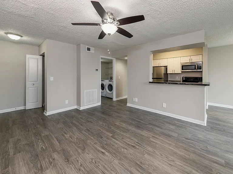 Our open-concept spaces seamlessly integrate the living room with the kitchen, fostering an easy flowing atmosphere at The View.