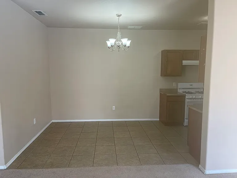 Dining room connected to kitchen and living room