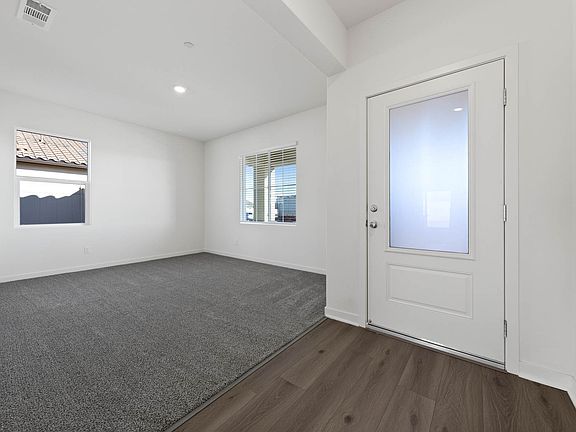 The dining room is off of the foyer.