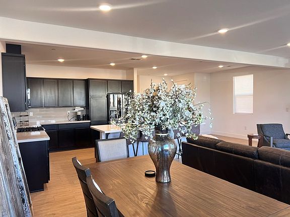 Dining table seats 8 easily but also has extensions to expand for more seating. Comes with 4 chairs and a long bench.