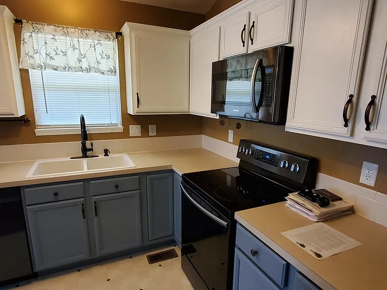 Kitchen, dishwasher, built-in microwave, oven, refrigerator