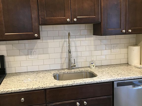 quartz countertops with subway tile backsplash