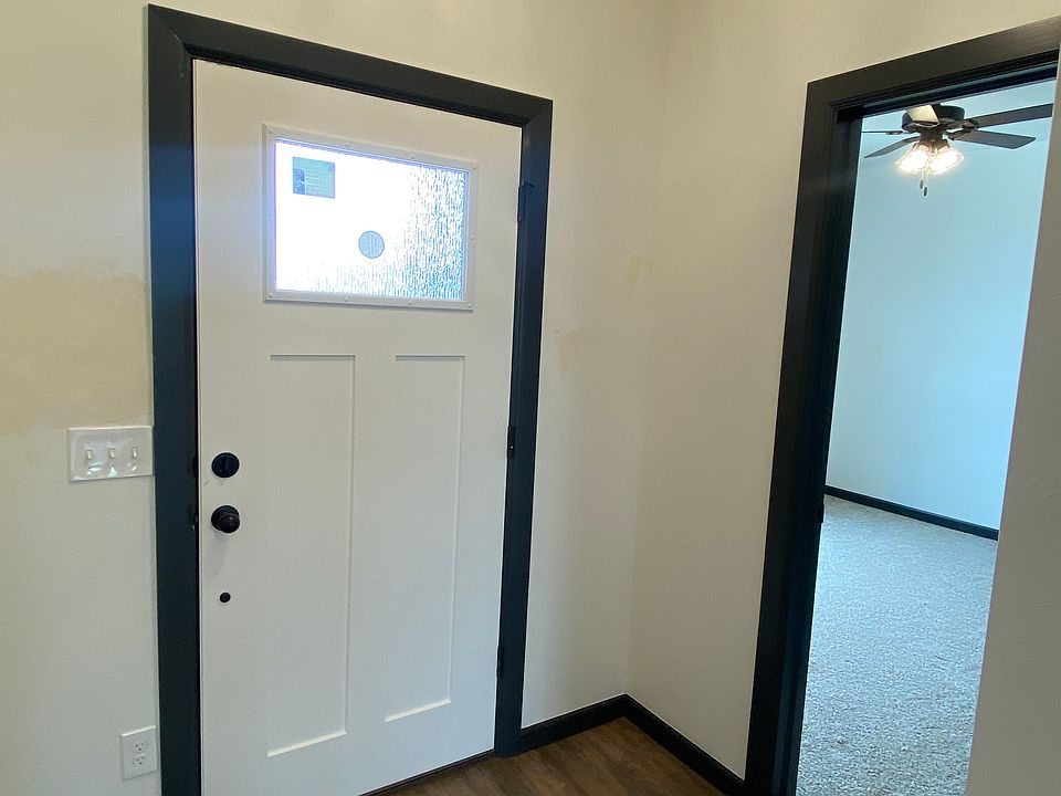 Front Door (also pictured: entry to bedroom #2)
